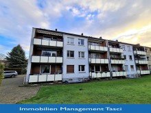 mit Logo Ihre neue Wohnung mit Balkon und Gartennutzung