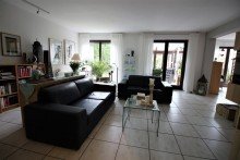 Wohnzimmer Ein Haus im Haus - Sie haben es verdient, hier zu wohnen.