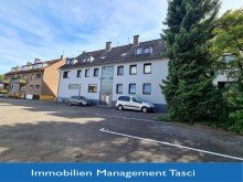 R�ckansicht mit Logo TOP gepflegte Anlageimmobilie