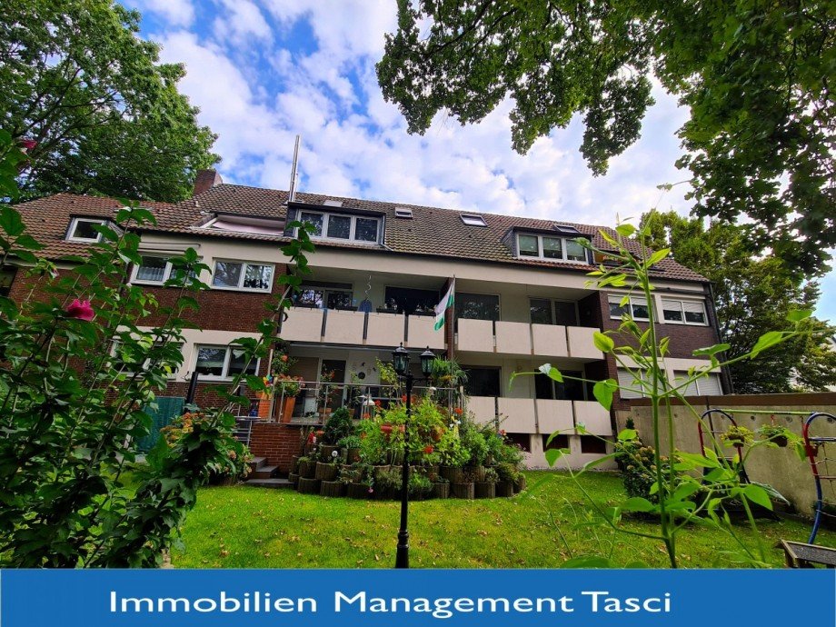 R�ckansicht mit Logo Etagenwohnung Gelsenkirchen