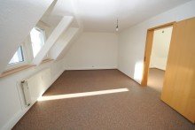 Wohnzimmer Hier wartet eine kuschelige Dachgeschosswohnung auf Sie