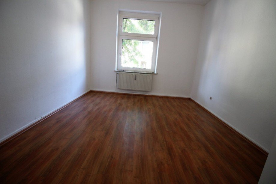 Wohnzimmer 1. OG rechts Mehrfamilienhaus Gelsenkirchen